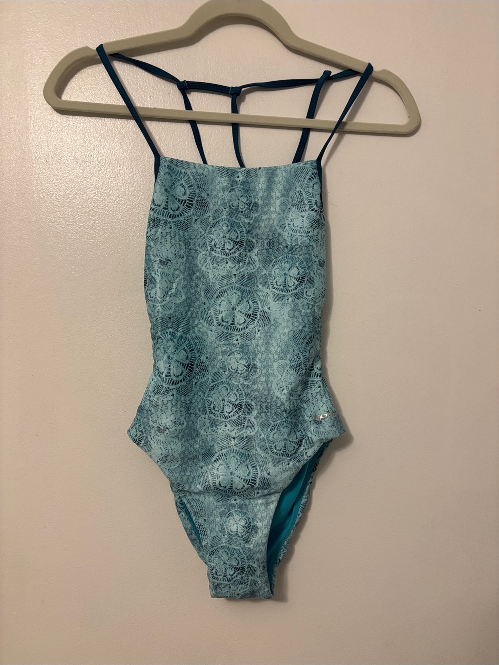 Woman’s Teal Lace-Print One-Piece Swimsuit with Tie Back